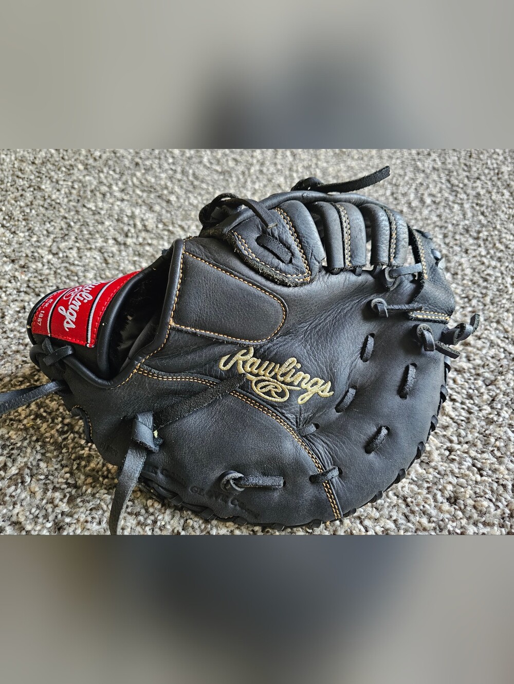 Rawlings Black Baseball Glove with Gold Script Accent
